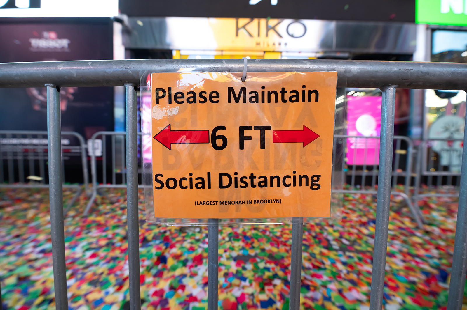 A social distancing sign is seen during a New Years Eve 2021 celebration in Times Square in New York City, on December 31, 2020. 