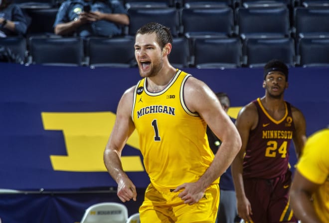 Hunter Dickinson, the University of Michigan Wolverines basketball student, leads the team in scoring. 