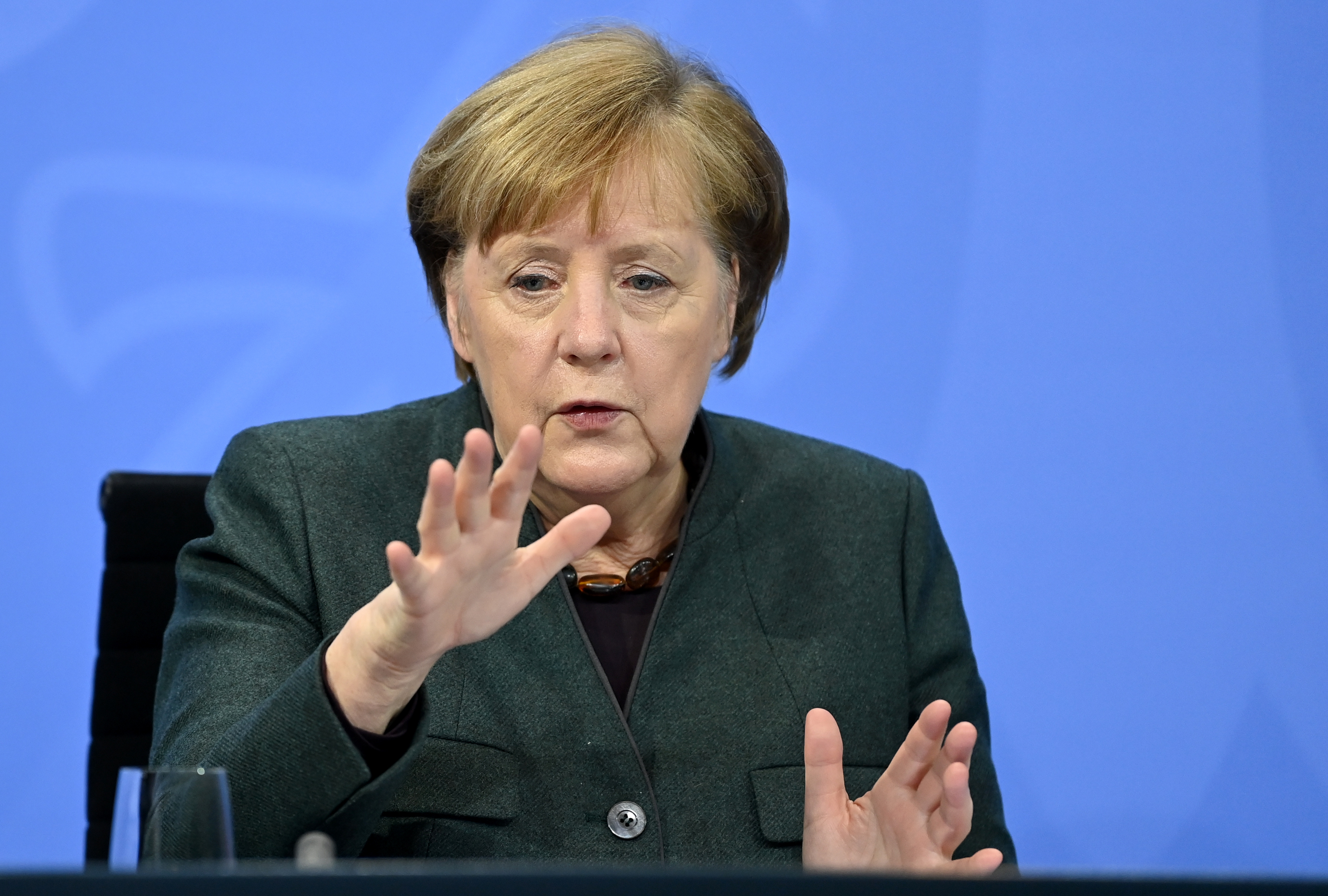 German Chancellor Angela Merkel speaks at a press conference following a videoconference with prime ministers of federal states to discuss new measures to reduce the number of Covid-19 infections on January 19.